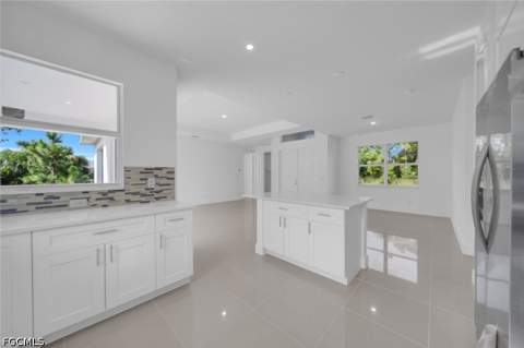 523 Harry Thayer Ave S, Lehigh Acres FL - photo 7 of 32
