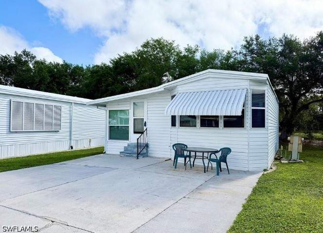 2 bedroom ManufacturedHome at 5 Bass Ln 5, Imperial Wilderness, Naples — photo 2