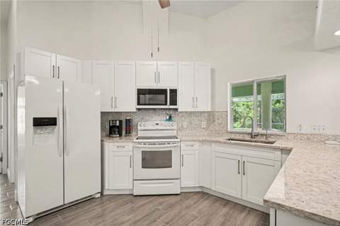 405 Poinsettia Ave, Lehigh Acres FL - photo 8 of 49