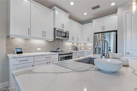 2555 Seychelles Dr 407, Naples FL - photo 12 of 42