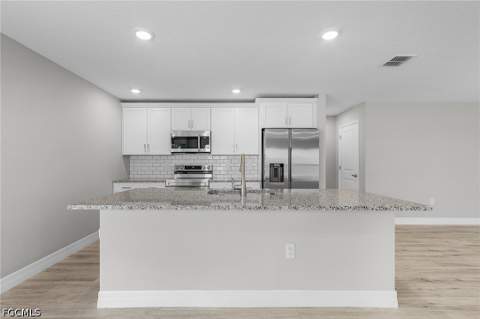337 Woodburn Dr, Lehigh Acres FL - photo 10 of 26