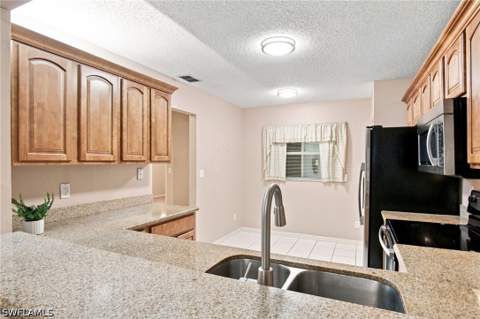 749 Landover Cir 203, Naples FL - photo 8 of 38