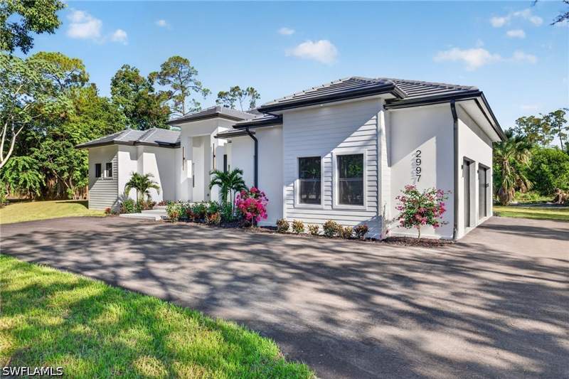 4 bedroom SingleFamilyResidence at 2997 64th St SW, Golden Gate Estates, Naples — photo 2