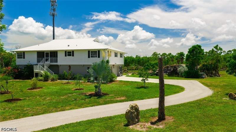 3 bedroom SingleFamilyResidence at 3989 Sunshine Blvd, St James City, St James City — photo 2