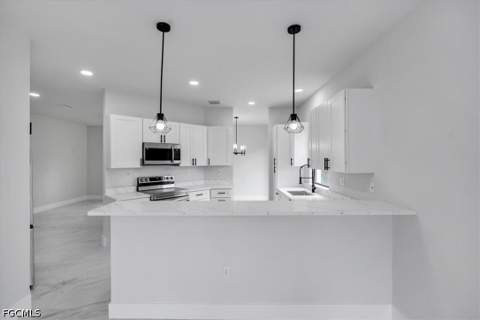 1222 Hilliard St E, Lehigh Acres FL - photo 12 of 16