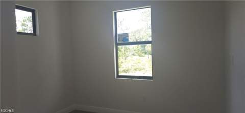 524 Aspen Ave S, Lehigh Acres FL - photo 13 of 29
