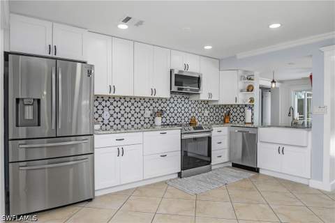 1072 Wisconsin Dr, Naples FL - photo 11 of 40