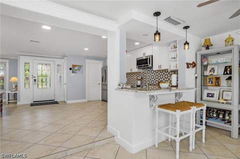 1072 Wisconsin Dr, Naples FL - photo 13 of 40