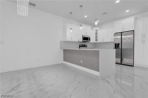 1102 Cortez Ave, Lehigh Acres FL - photo 10 of 34