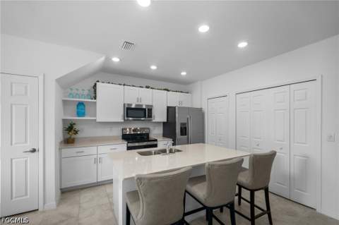 14087 Oviedo Pl, Fort Myers FL - photo 9 of 32