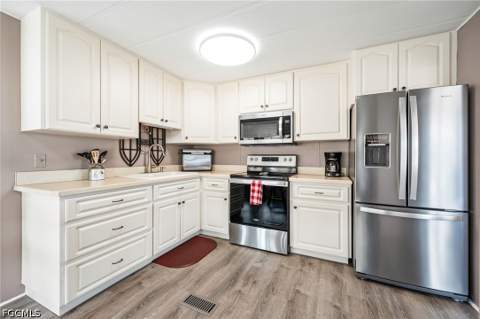 478 Nicklaus Blvd, North Fort Myers FL - photo 12 of 33