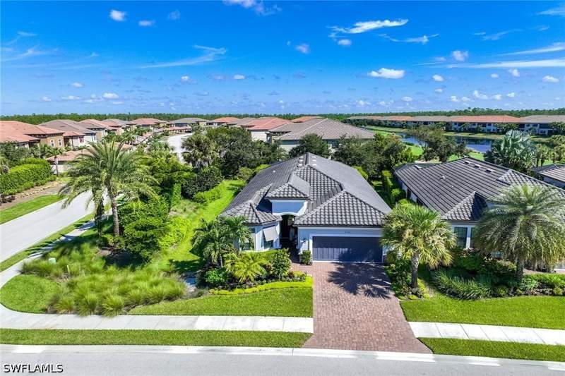4 bedroom SingleFamilyResidence at 9356 Montelanico Loop, Esplanade, Naples — photo 2