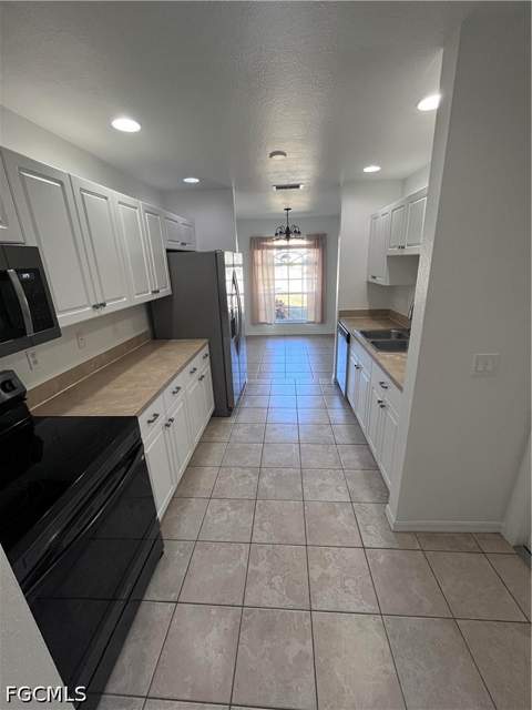1066 Barnett St E, Lehigh Acres FL - photo 9 of 16