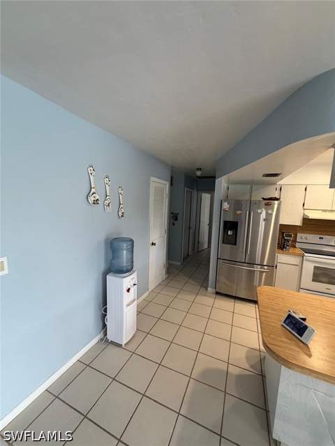 704 Cleveland Ave, Lehigh Acres FL - photo 7 of 48