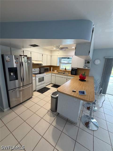 704 Cleveland Ave, Lehigh Acres FL - photo 8 of 48