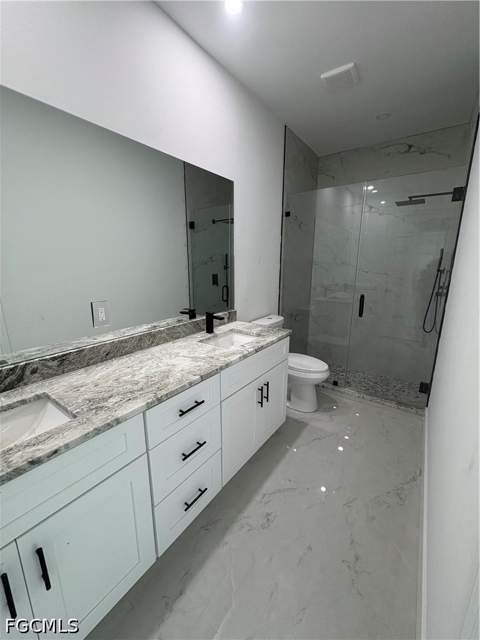 2804 25th St SW, Lehigh Acres FL - photo 6 of 15