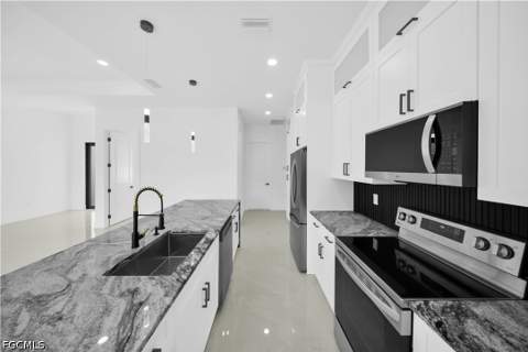 808 Willard Ave, Lehigh Acres FL - photo 6 of 34