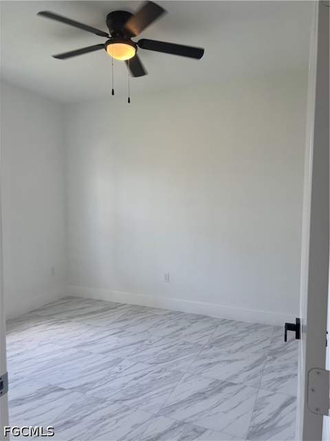 1016 Grant Blvd, Lehigh Acres FL - photo 8 of 11