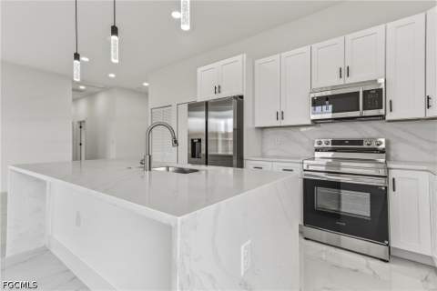4002 9th St SW, Lehigh Acres FL - photo 10 of 59