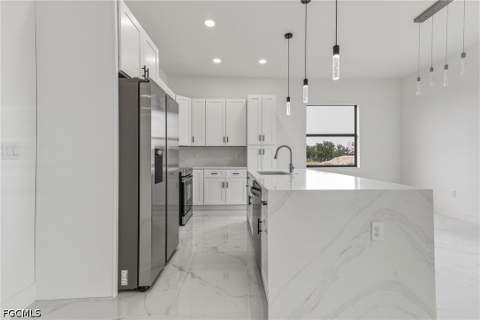 4002 9th St SW, Lehigh Acres FL - photo 8 of 59