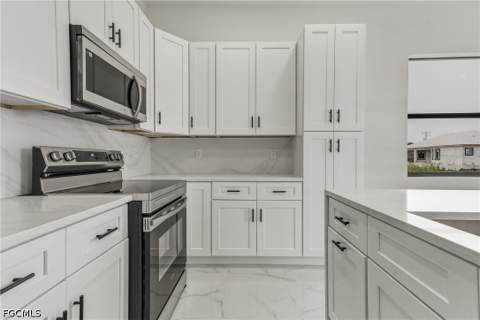 4002 9th St SW, Lehigh Acres FL - photo 9 of 59