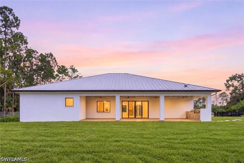 5 bedroom SingleFamilyResidence at 98 10th St NE, Golden Gate Estates, Naples — photo 2