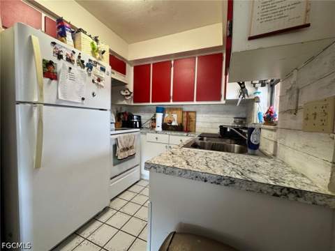 320 Inwood Ave S, Lehigh Acres FL - photo 10 of 39