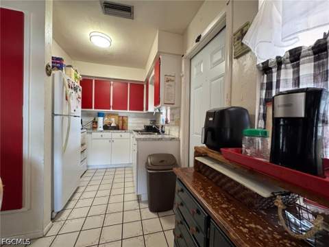 320 Inwood Ave S, Lehigh Acres FL - photo 11 of 39