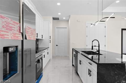 3319 30th St SW, Lehigh Acres FL - photo 10 of 43