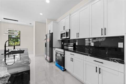 3319 30th St SW, Lehigh Acres FL - photo 6 of 43