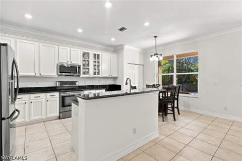 1289 Barrigona Ct, Naples FL - photo 9 of 36
