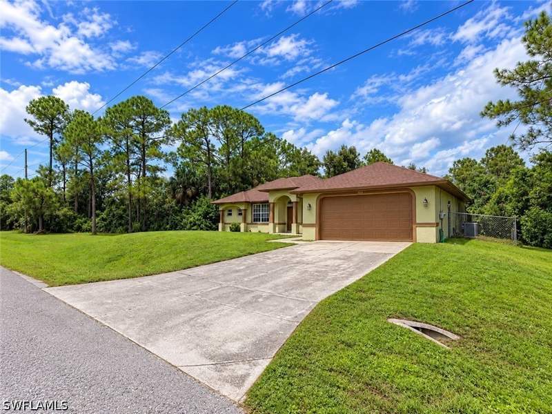 4 bedroom SingleFamilyResidence at 2702 25th St W, Lehigh Acres, Lehigh Acres — photo 4