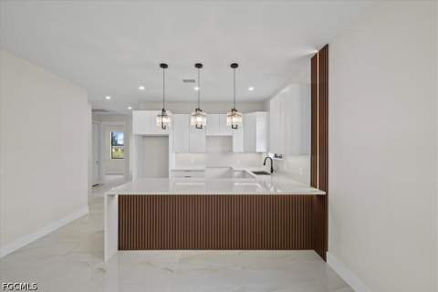 1025 Marshall Ave S, Lehigh Acres FL - photo 7 of 32