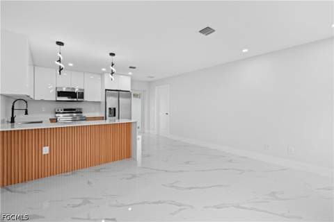 755 Fleming Ave S, Lehigh Acres FL - photo 8 of 33