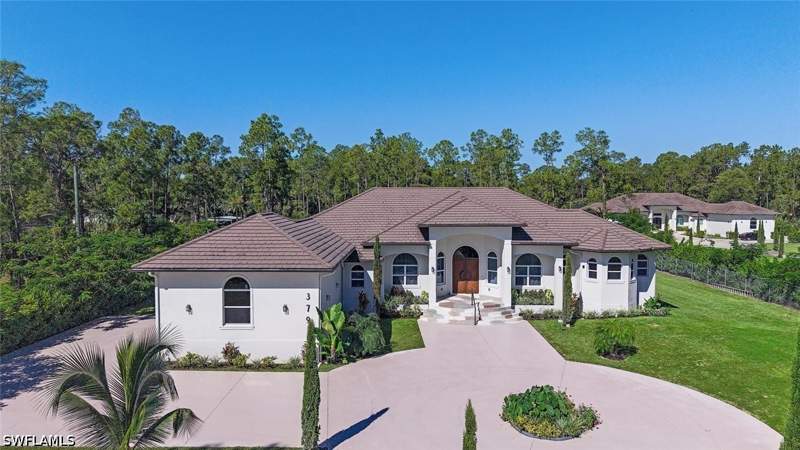 4 bedroom SingleFamilyResidence at 379 25th St NW, Golden Gate Estates, Naples — photo 2