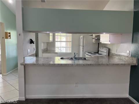 1708 Kings Lake Blvd 204, Naples FL - photo 8 of 34
