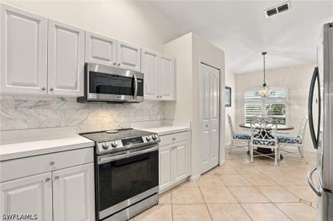 5253 Whitten Dr, Naples FL - photo 11 of 37