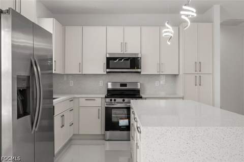 925 Manresa Ave S, Lehigh Acres FL - photo 11 of 42