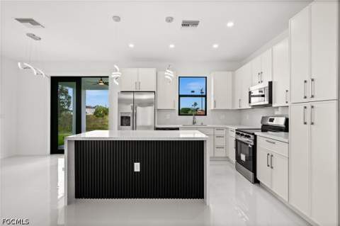 925 Manresa Ave S, Lehigh Acres FL - photo 12 of 42