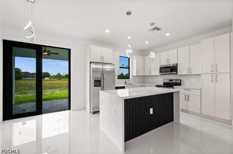 925 Manresa Ave S, Lehigh Acres FL - photo 13 of 42