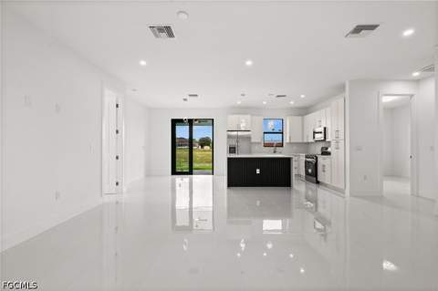 925 Manresa Ave S, Lehigh Acres FL - photo 8 of 42