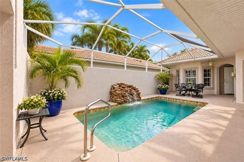 2 bedroom SingleFamilyResidence at 104 Glen Eagle Cir, Addison Reserve, Naples — photo 2