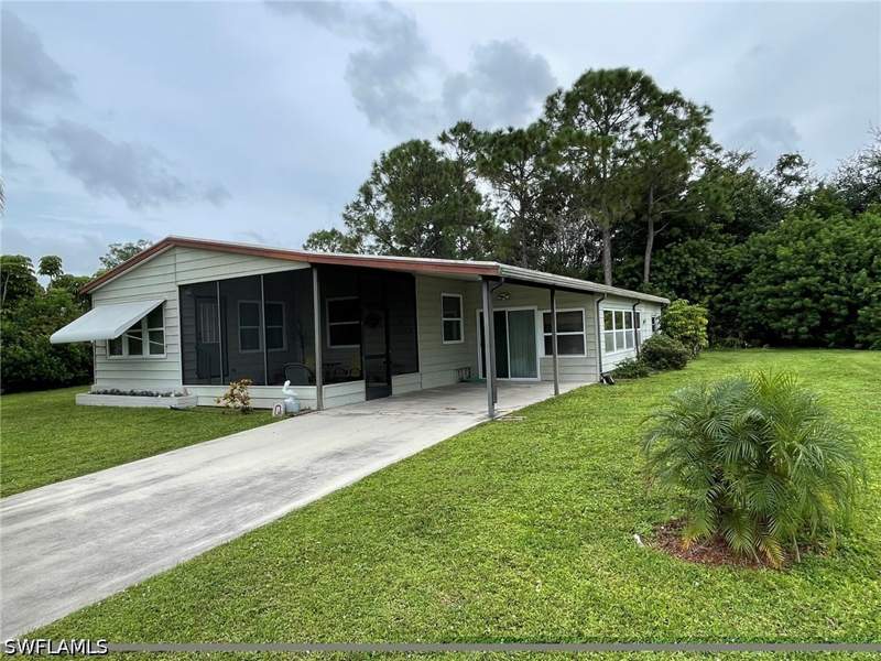 2 bedroom ManufacturedHome at 26256 Squire Ln, Imperial Harbor, Bonita Springs — photo 2
