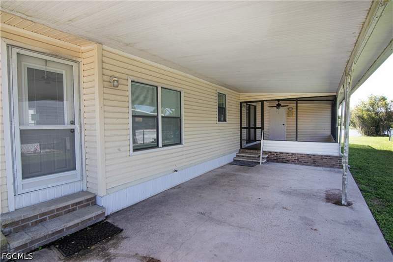 2 bedroom ManufacturedHome at 2425 Zoysia Ln, Spring Woods M/H Subd, North Fort Myers — photo 3
