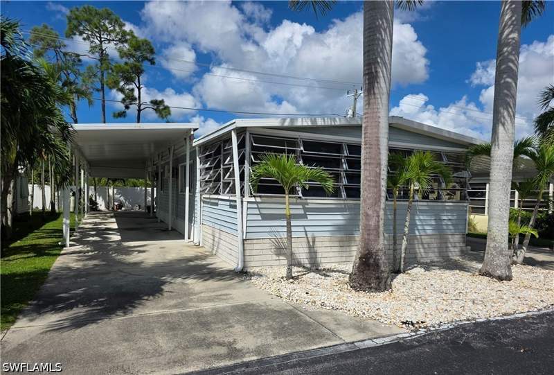 2 bedroom ManufacturedHome at 9 Navajo Trl, Hitching Post Mobile Home Park, Naples — photo 2