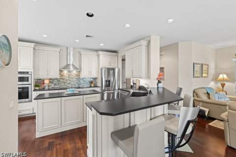 5075 Yacht Harbor Dr 103, Naples FL - photo 9 of 49