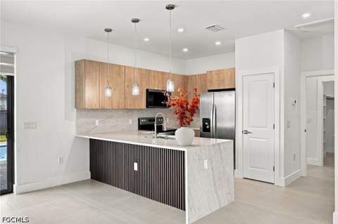 344 NE 10th Ter, Cape Coral FL - photo 6 of 35