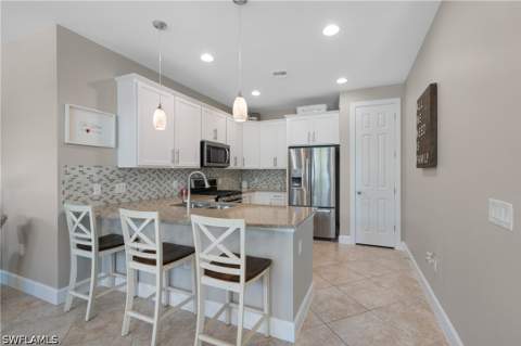 7602 Jacaranda Ln, Naples FL - photo 11 of 39