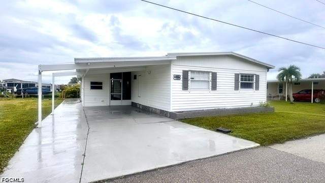 2 bedroom ManufacturedHome at 14657 Paul Revere Loop, Old Bridge Village, North Fort Myers — photo 2