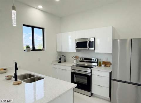 4238 NW 34th Ter, Cape Coral FL - photo 10 of 42
